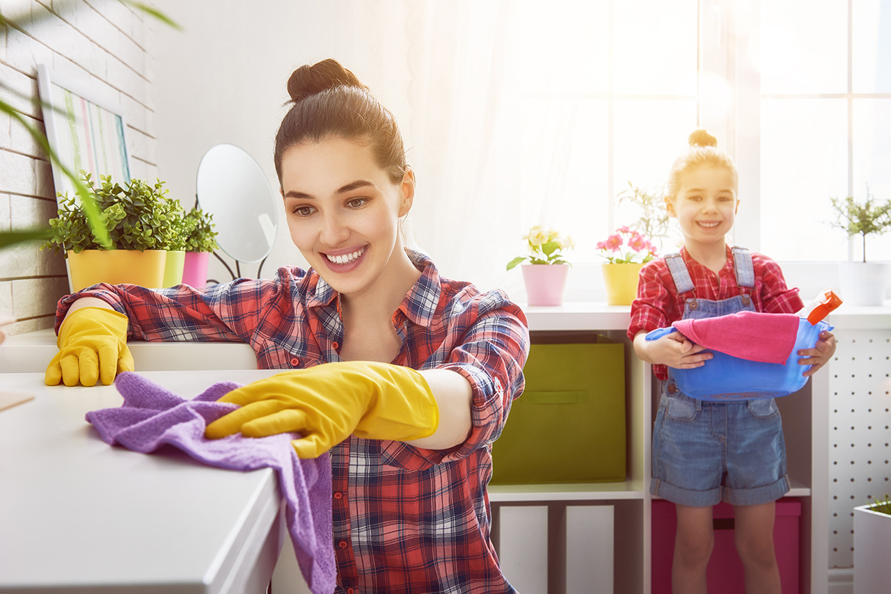 bigstock-Happy-family-cleans-the-room--121789589